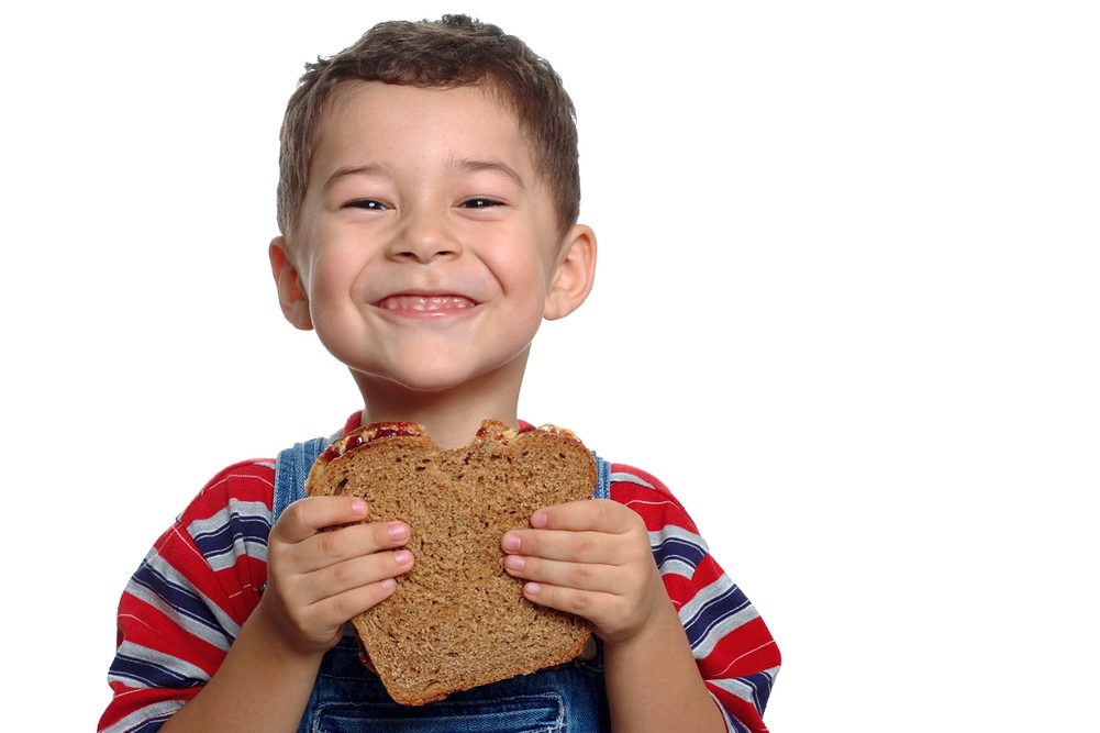 Child eating sandwich