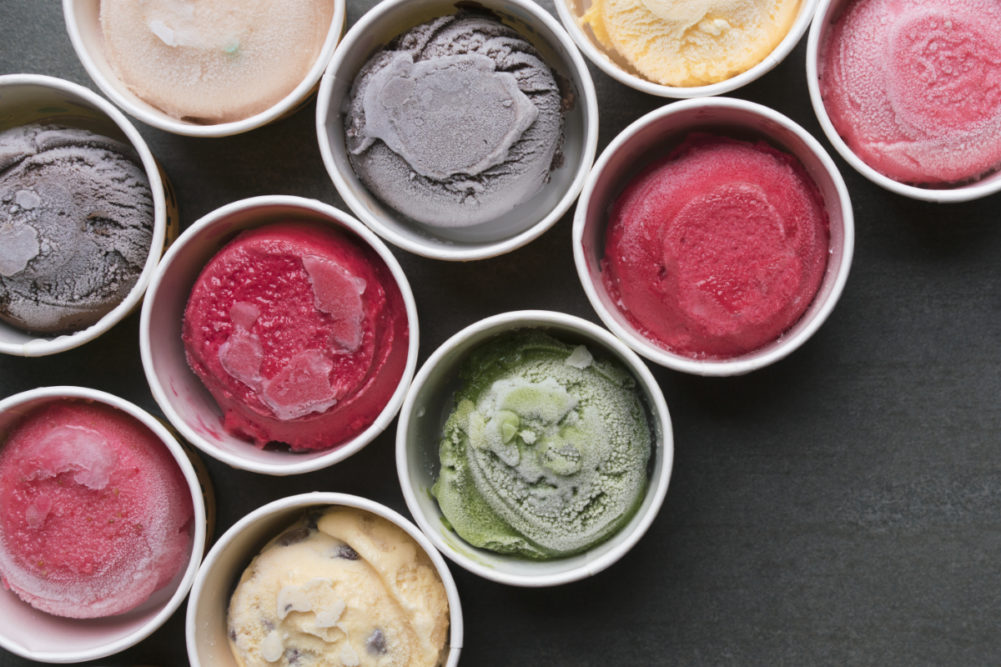 Tubs of ice cream in various flavors