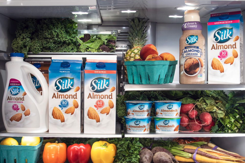 Silk plant-based dairy alternative products in the refrigerator, Danone