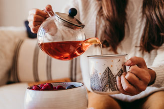 Woman pouring tea