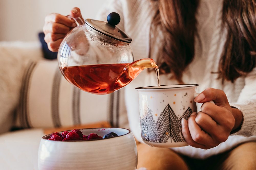 Woman pouring tea