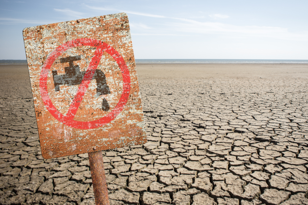 No fresh water sign in dry cracked earth