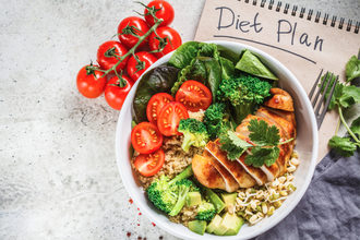Diet plan notebook and healthy food