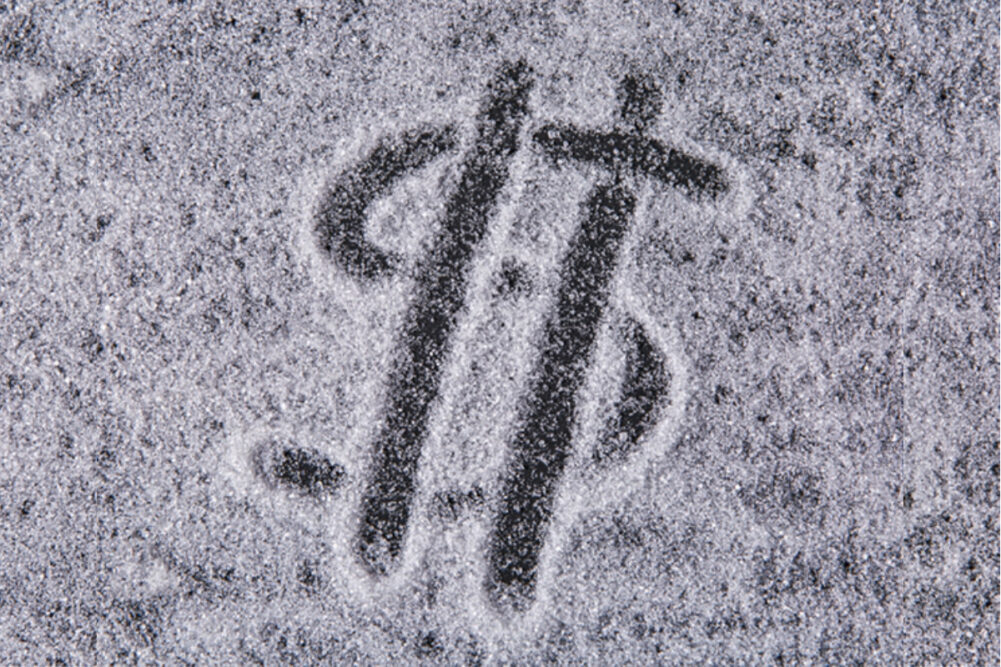 Money symbol drawn in sugar