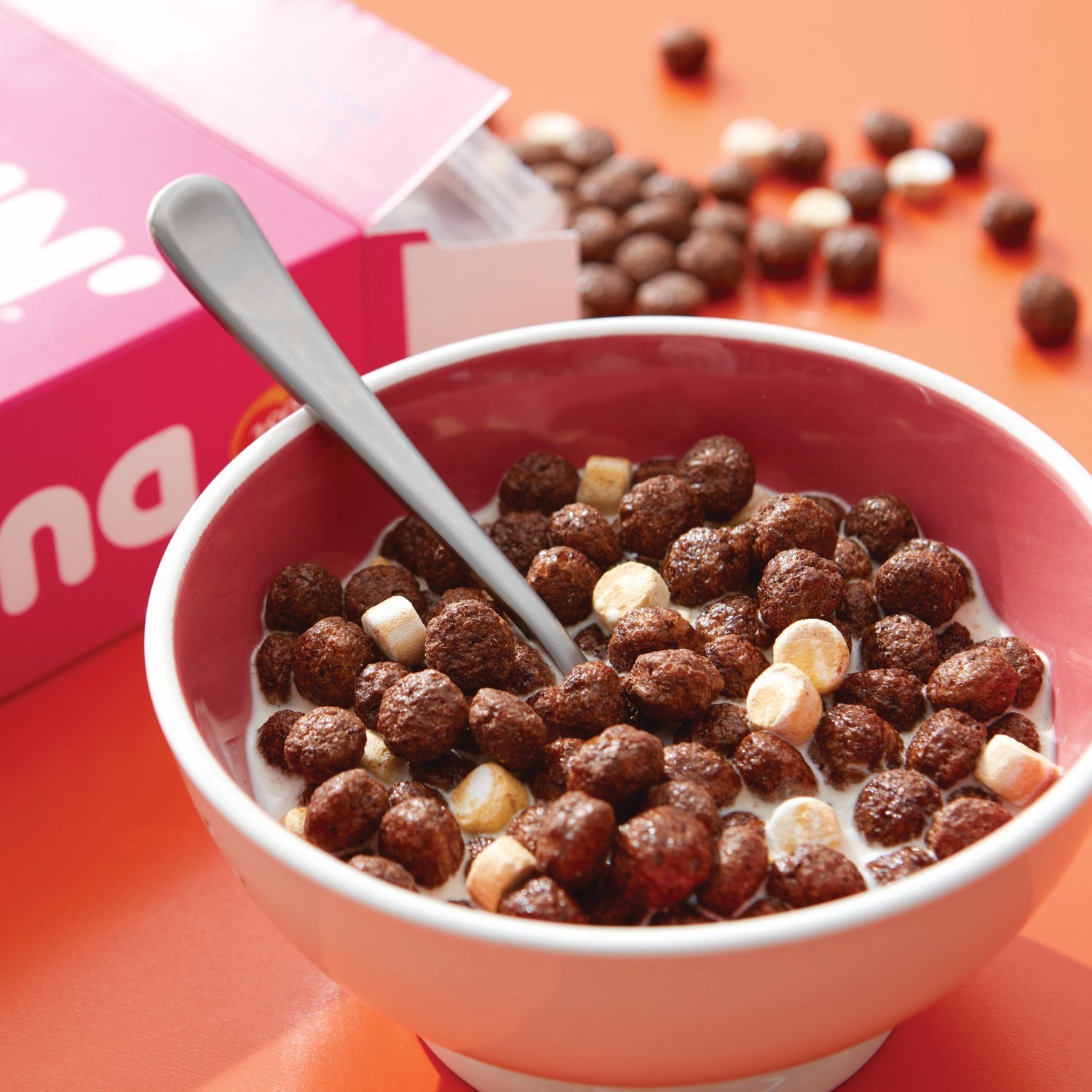 Dunkin' cereal in bowl with milk