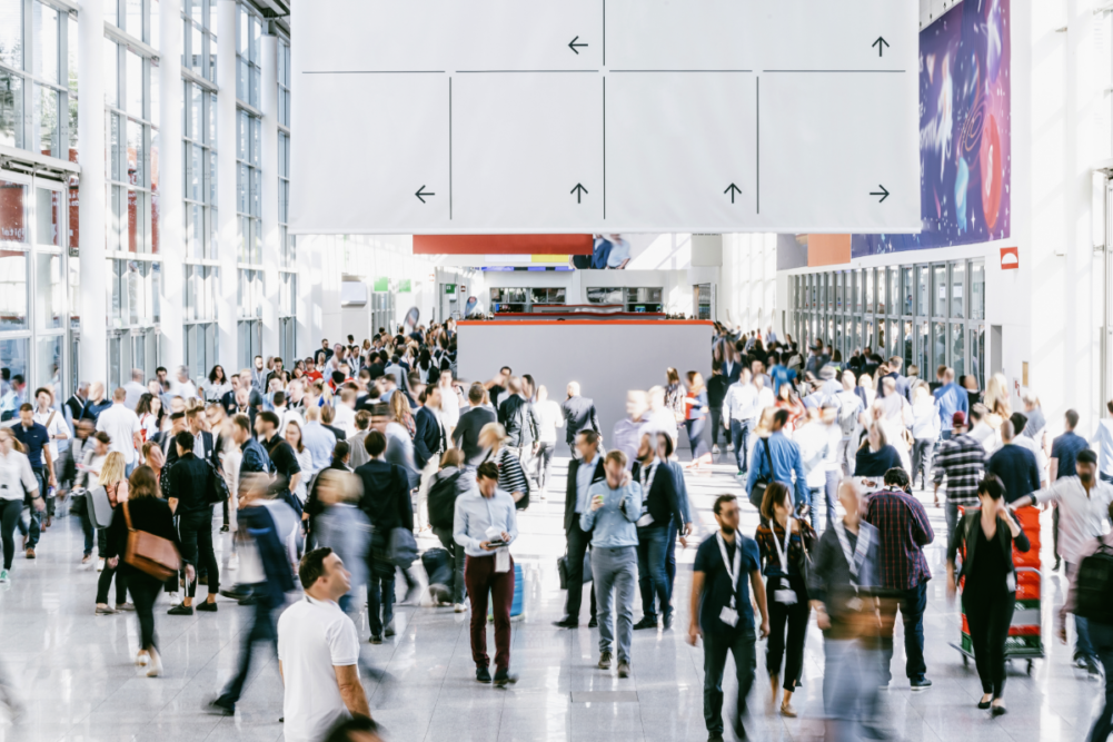 Crowd of people walking on a trade show