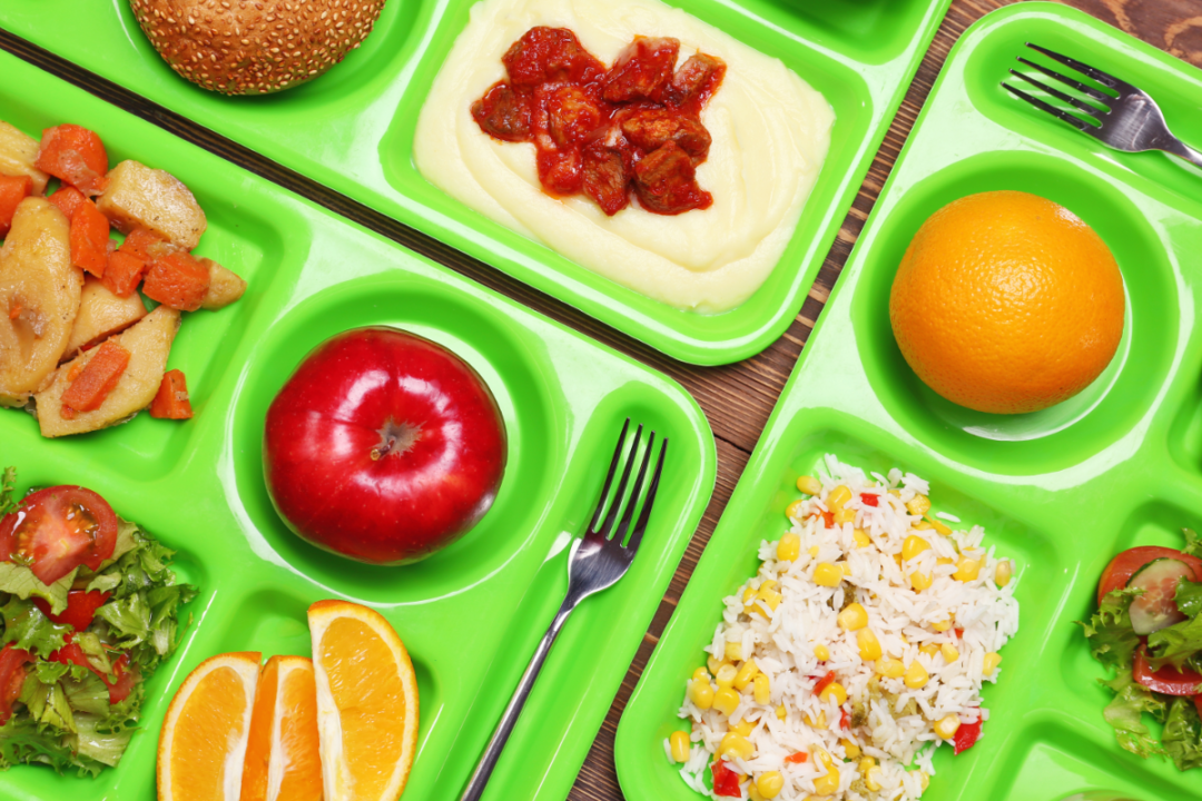 School lunch serving trays with food