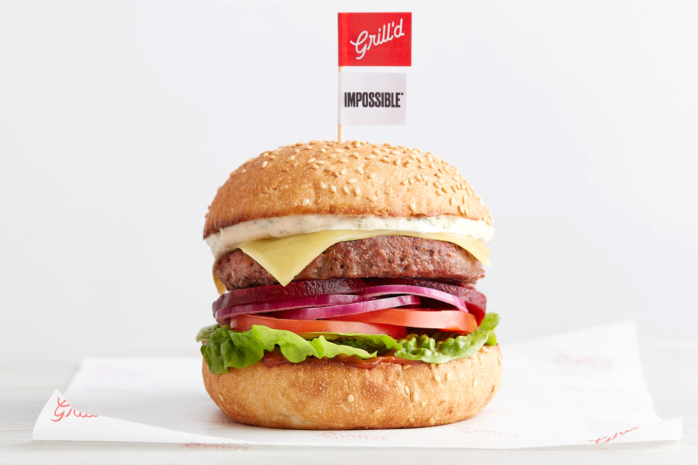 Plant-based Impossible Burger from Impossible Foods on dinner plate