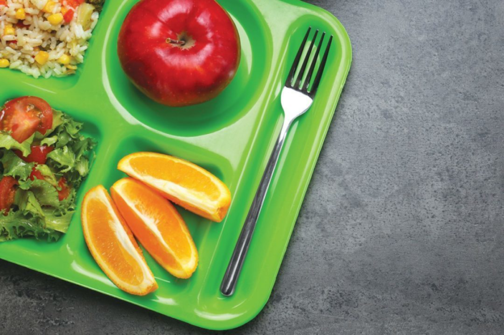 School lunch tray with oatmeal and other healthy foods