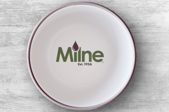 Milne Fruit Products logo in a bowl