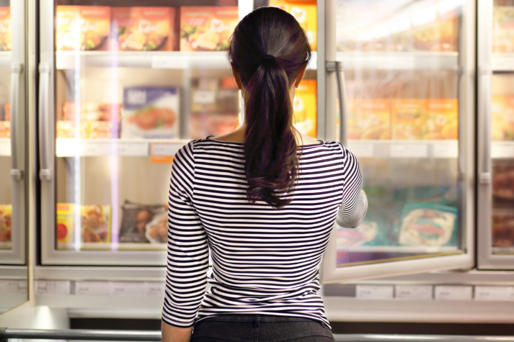 Woman shopping in grocery store