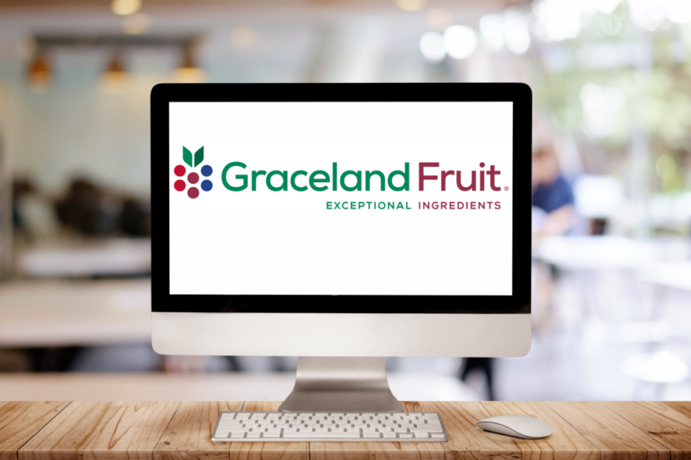 Computer screen with new Graceland Fruit logo