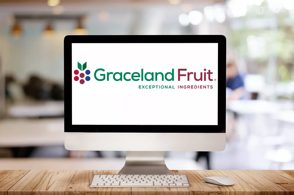 Computer screen with new Graceland Fruit logo