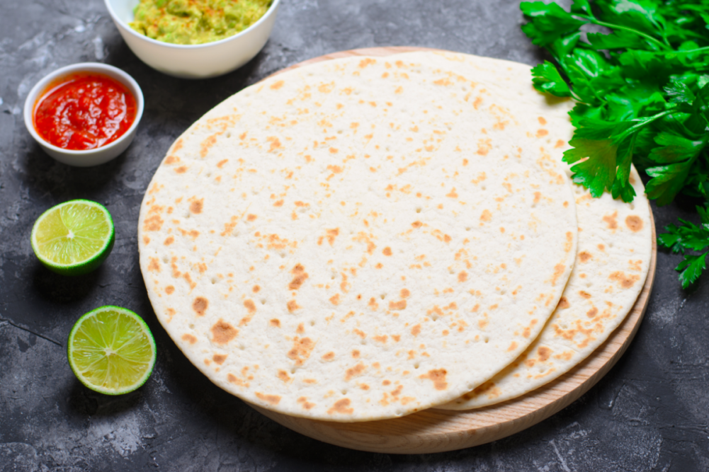 Plain Tortillas with Tomato Salsa, Guacamole and Fresh Parsley on Dark Background, Wheat Tortillas, Mexican Food