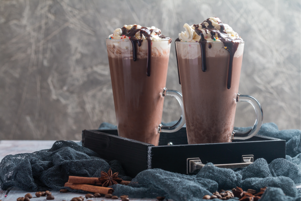 Chocolate cookie milkshake in tall mugs