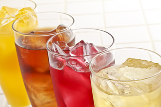 Variety of colorful beverages in clear glasses