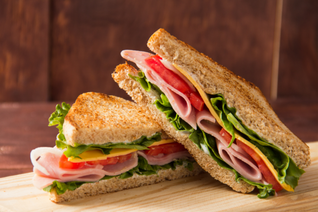 Sandwich bread tomato, lettuce and yellow cheese