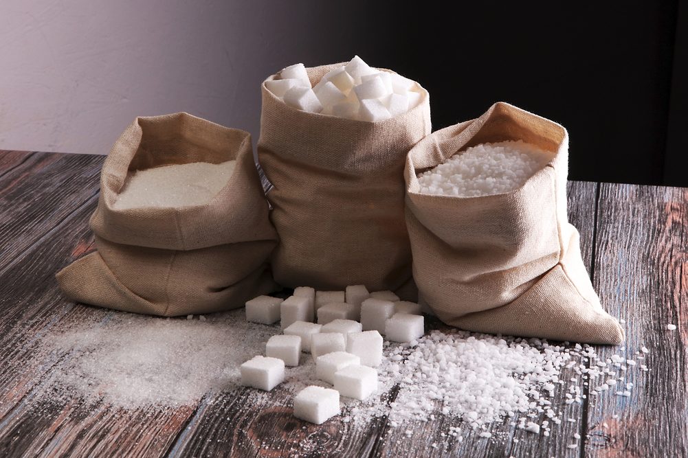 Three bags of sugar in various formats