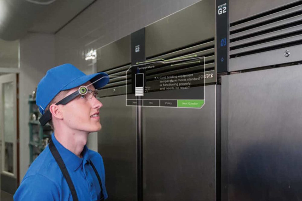 Worker conducting inspection using smart glasses