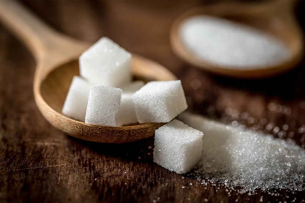 Sugar cubes in a spoon