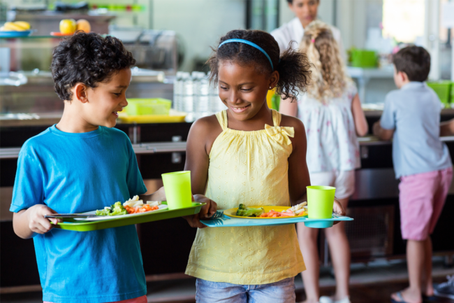 Children at school lunchtime