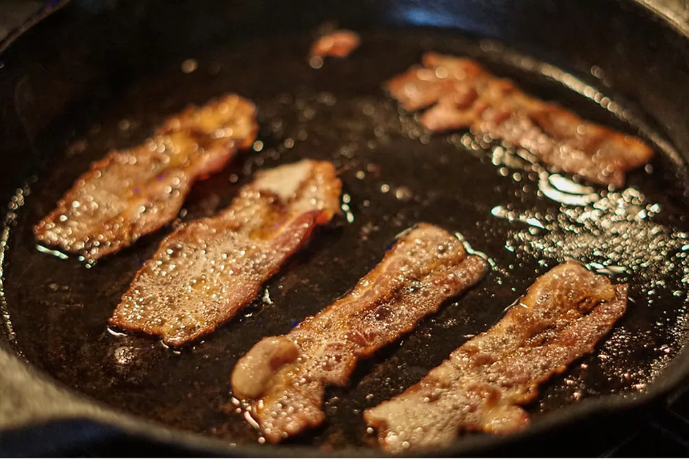 Bacon cooking in pan