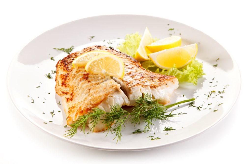 Baked fish with lemon
