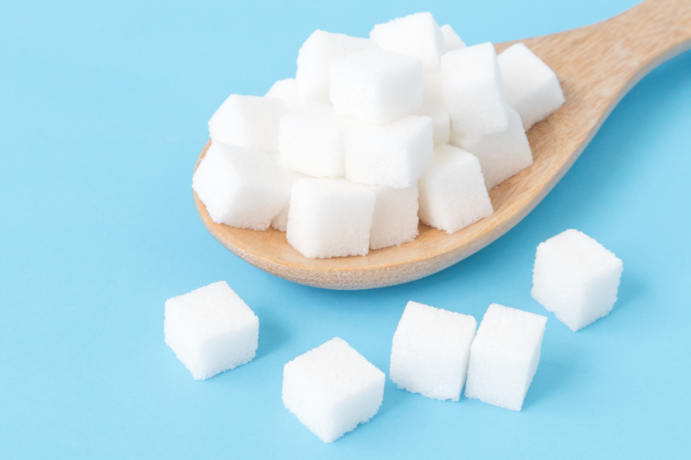 Sugar cubes in a spoon