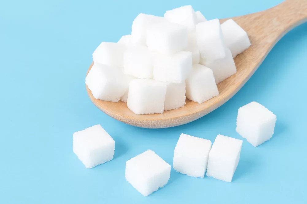 Sugar cubes in a spoon