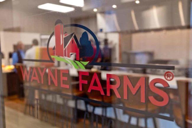 Wayne Farms logo on a door