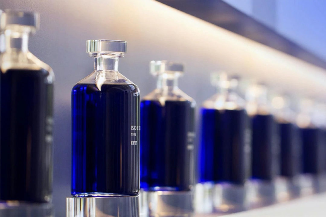 Blue liquid in glass bottles