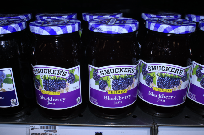 Smucker Blackberry Jam on a metal shelf