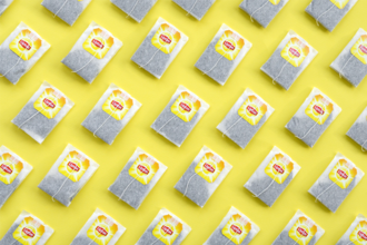 Lipton teabags on a yellow background
