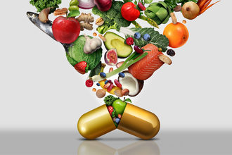 Healthy foods going into a capsule