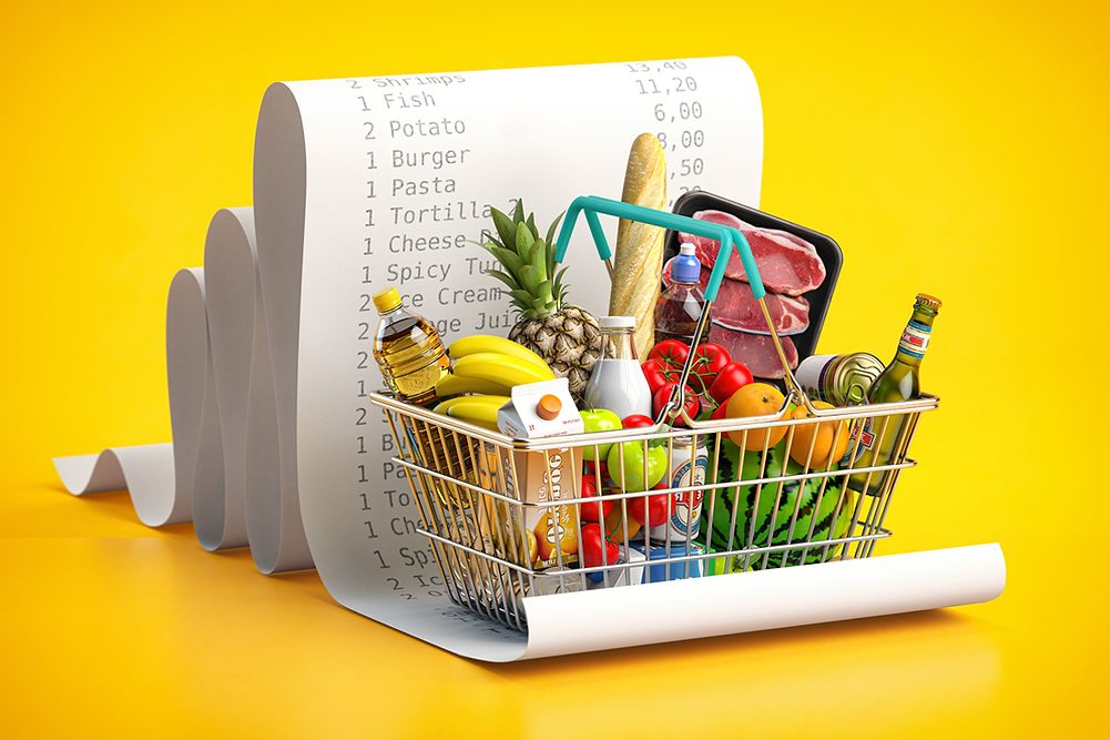 A grocery basket on top of a large reciept