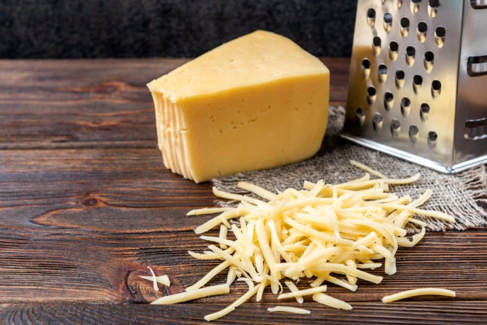 Cheese shreds and a grater