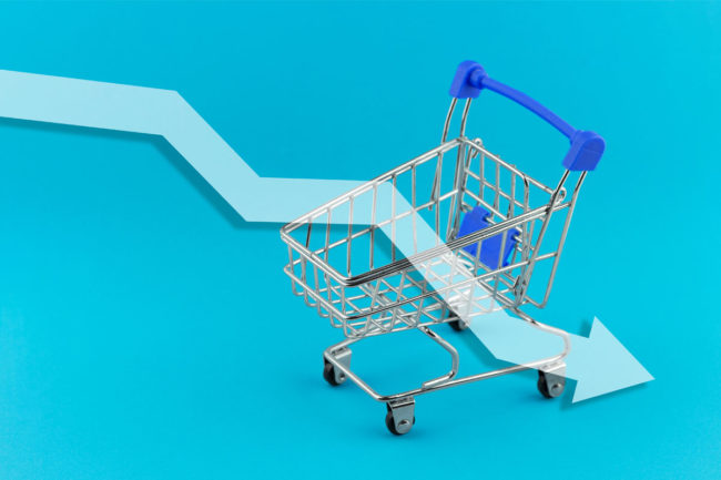 Shopping cart with arrow declining