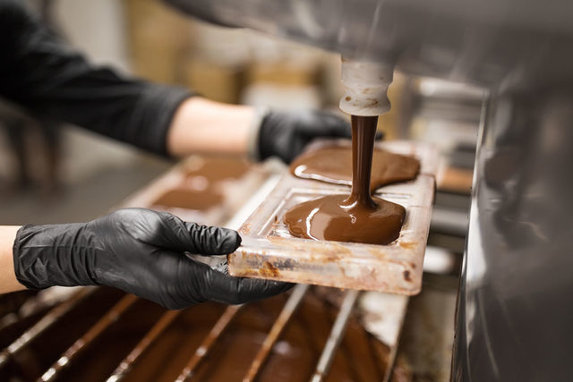 Chocolate pouring into mould