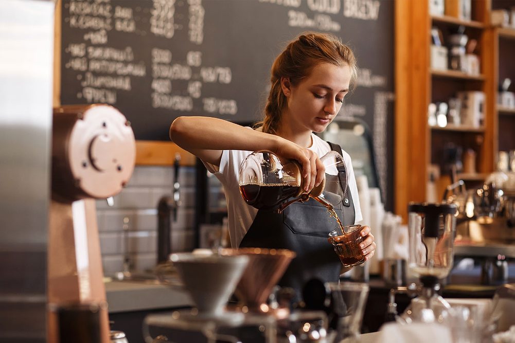 Barista making coffee