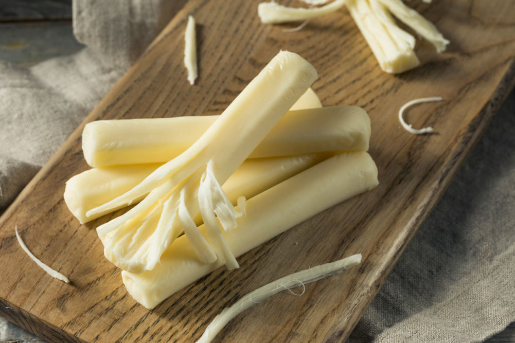 string cheese on cutting board