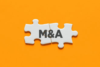 Merger and acquisition puzzle pieces 
