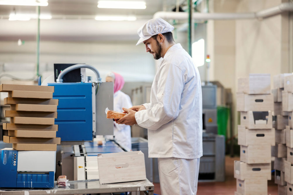 Worker at a meat packaging plant