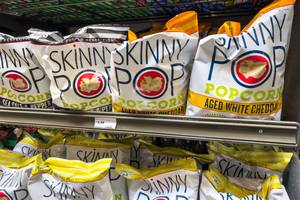 Skinny Pop products on a grocery store shelf