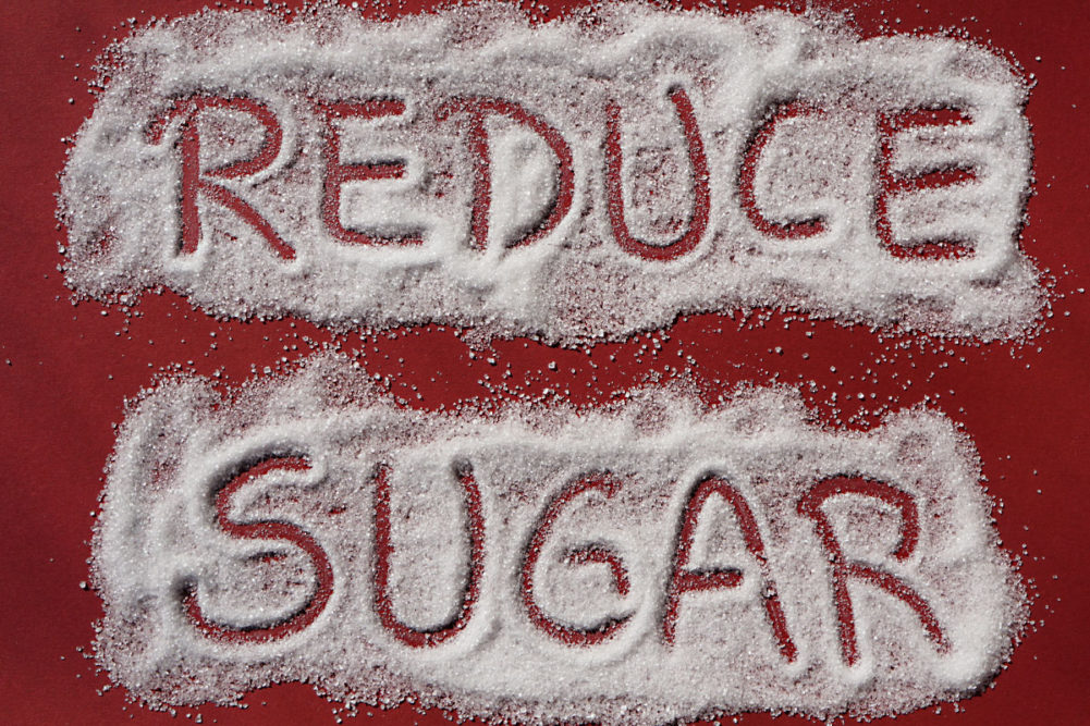 'Reduce sugar' written in sugar