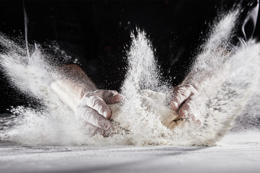 Person making bread