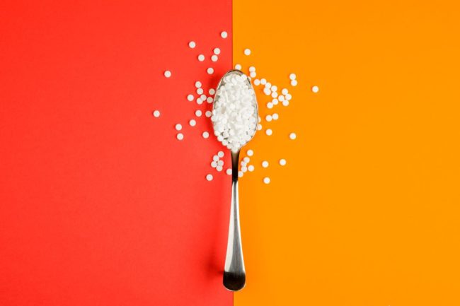 Sugar replacing tablets on a spoon
