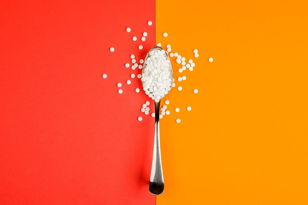 Sugar replacing tablets on a spoon