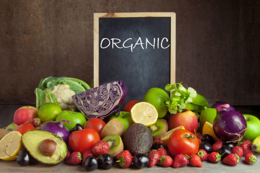 Organic foods under a chalkboard