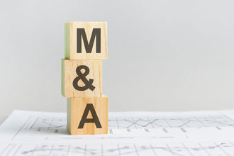 Wooden blocks with M and A on them