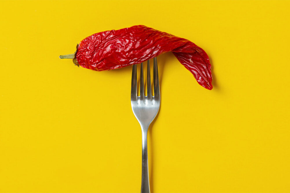 Dried red pepper on a fork